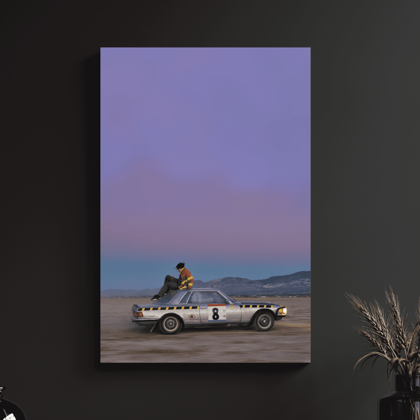 a painting of a man riding on the hood of a car